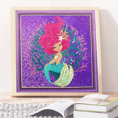 Vibrant Diamond Painting Kit featuring a mermaid design with colorful gems on a purple background
